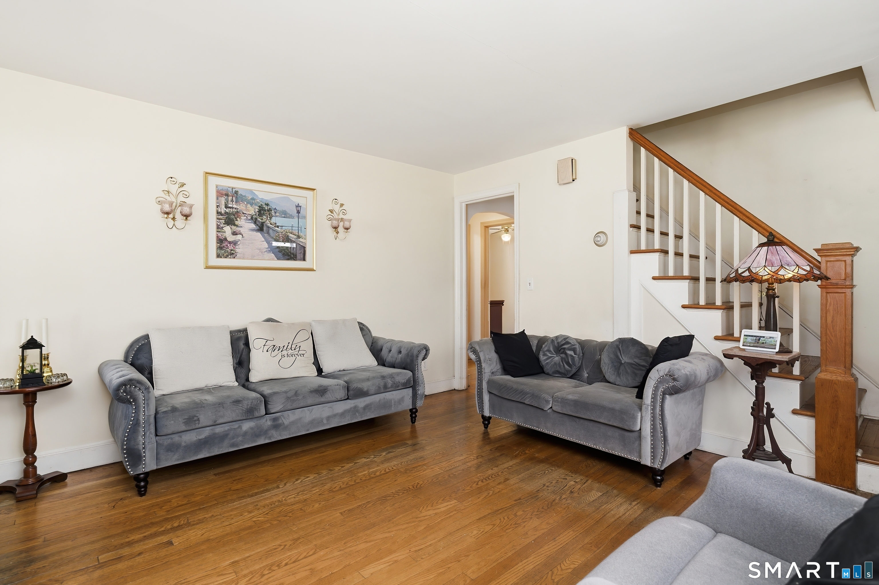 170 Hillside Avenue Bridgeport, CT 06604 - Photo 5 of 35 a living room with furniture and a wooden floor