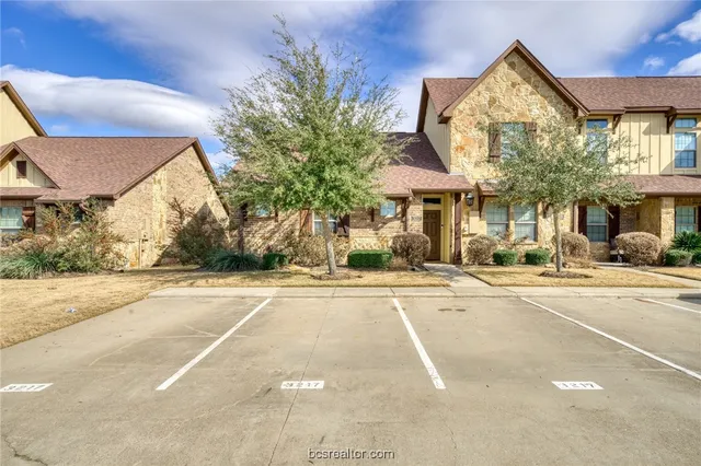 a view of a building with a street