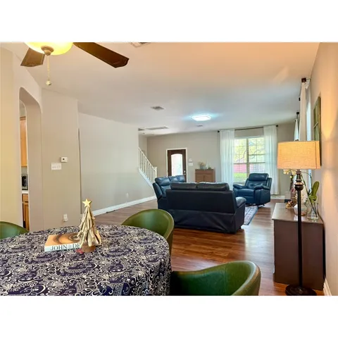 a living room with furniture and a table