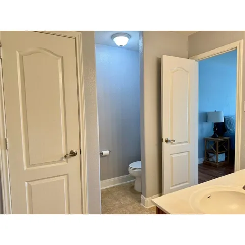 a bathroom with a sink a mirror and a bathtub