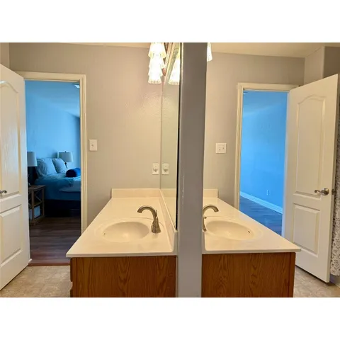 a bathroom with a sink a bathtub and a shower