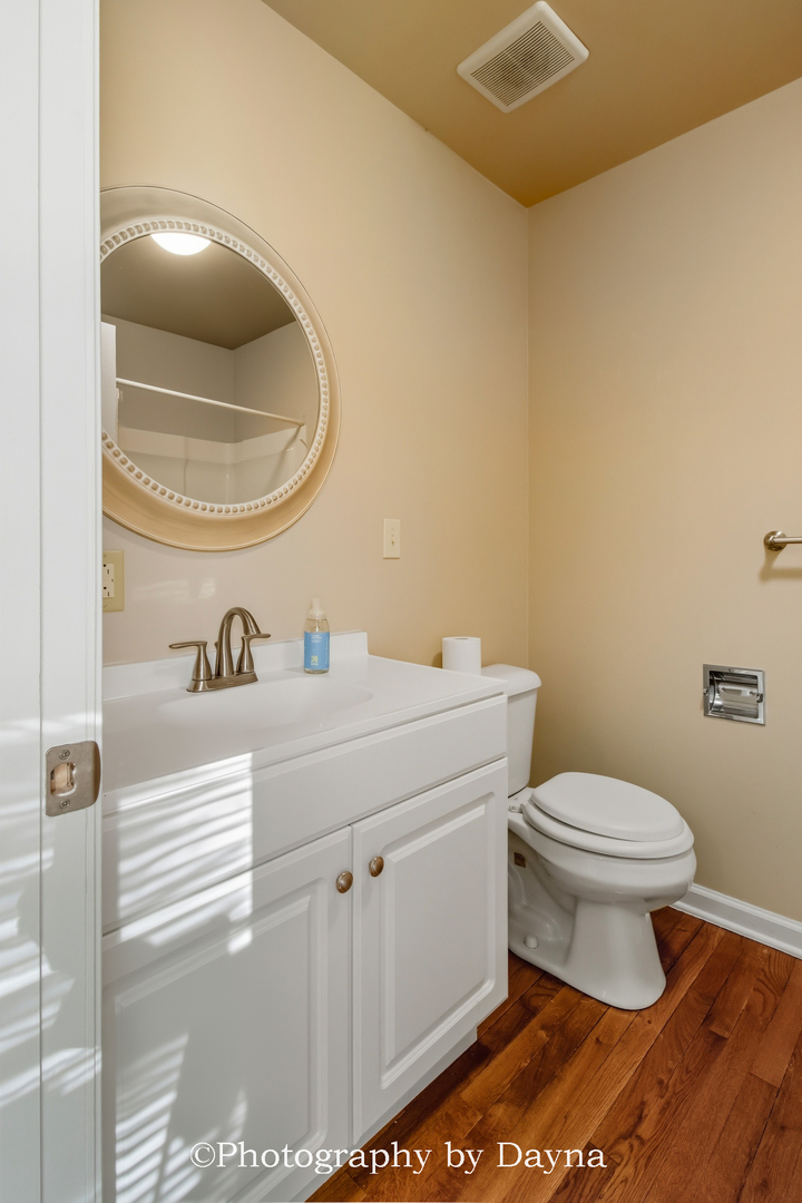 711 Sycamore Street Watseka, IL 60970 - Photo 16 of 21 a bathroom with a sink and a toilet