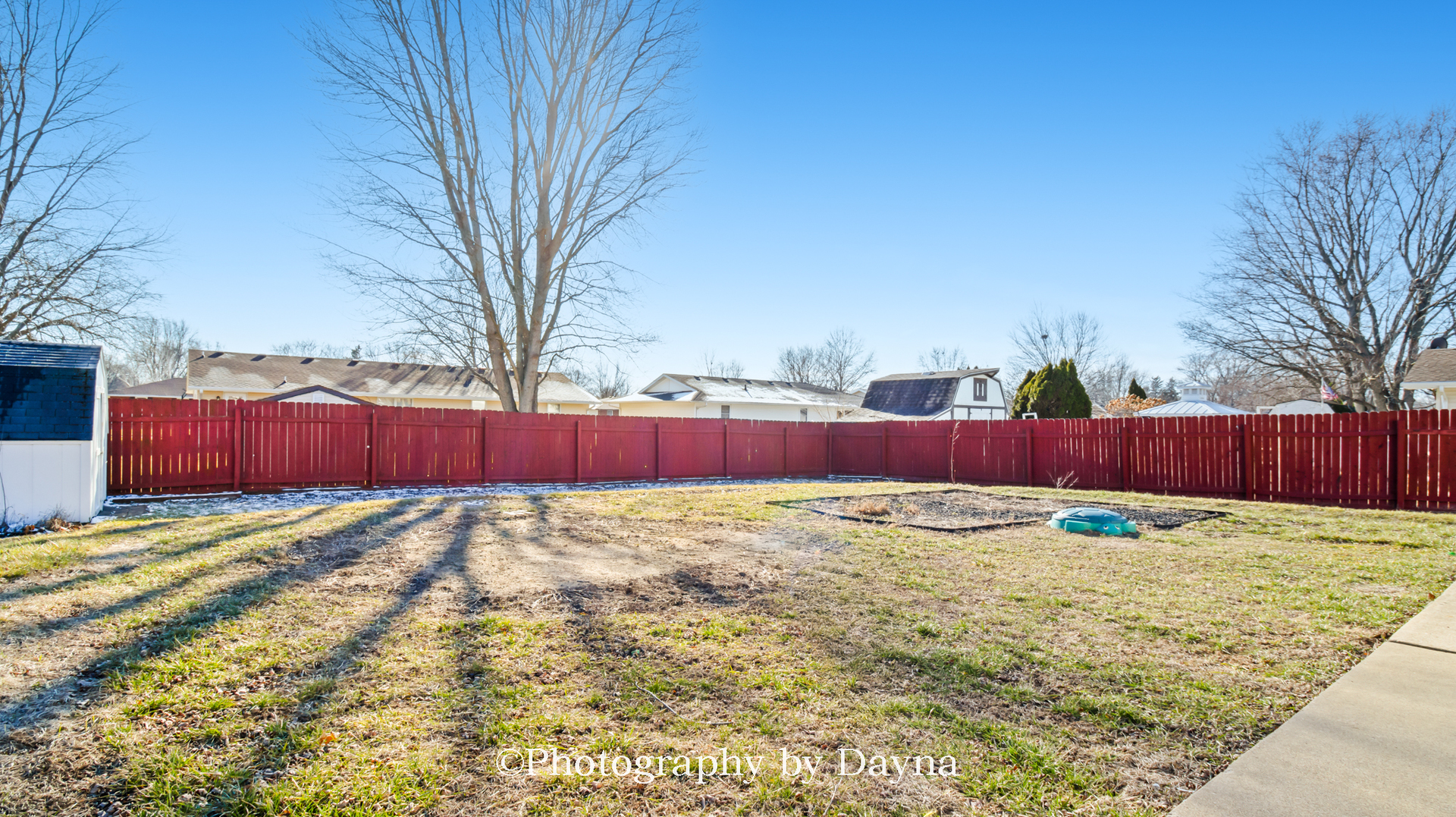 711 Sycamore Street Watseka, IL 60970 - Photo 19 of 21 a view of a yard with wooden fence