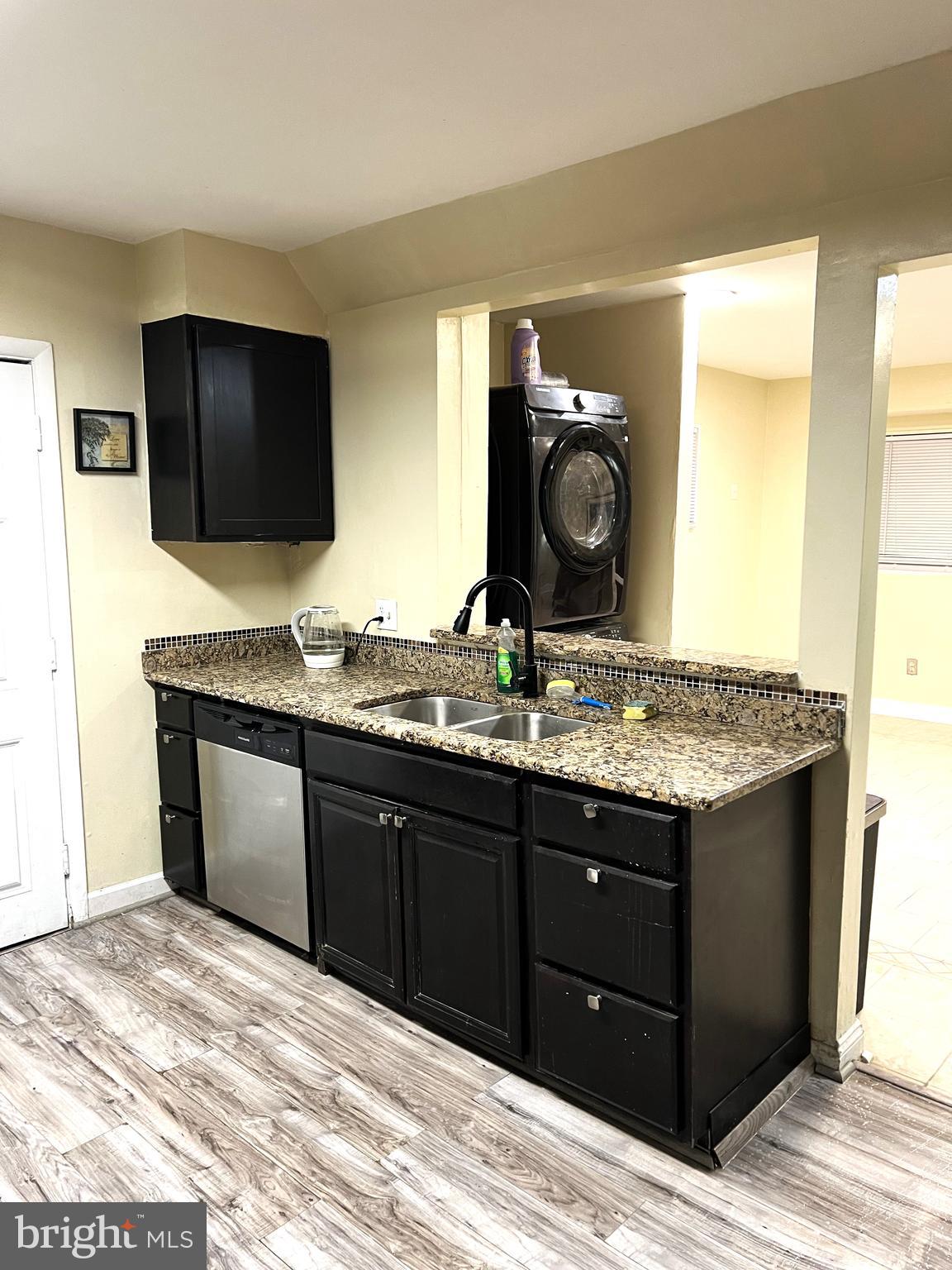 11321 College View Drive Silver Spring, MD 20902 - Photo 11 of 75 a bathroom with a granite countertop sink and a mirror