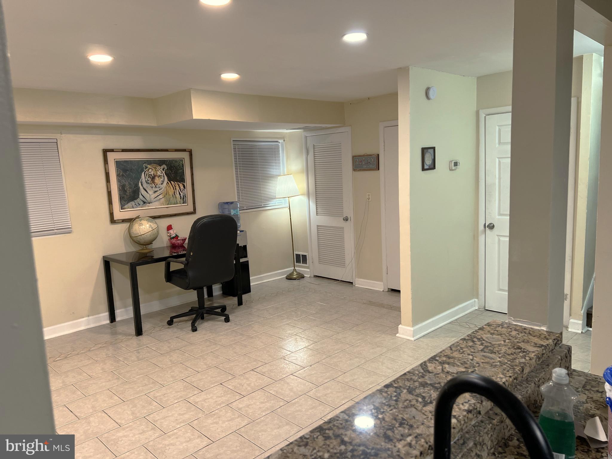 11321 College View Drive Silver Spring, MD 20902 - Photo 12 of 75 a workspace with furniture and a window