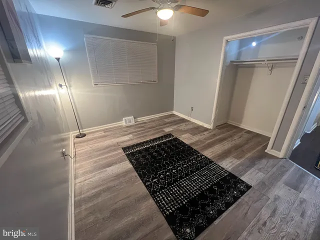 a view of a fountain in front of a house