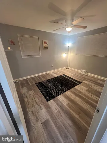 a view of a living room and bathroom