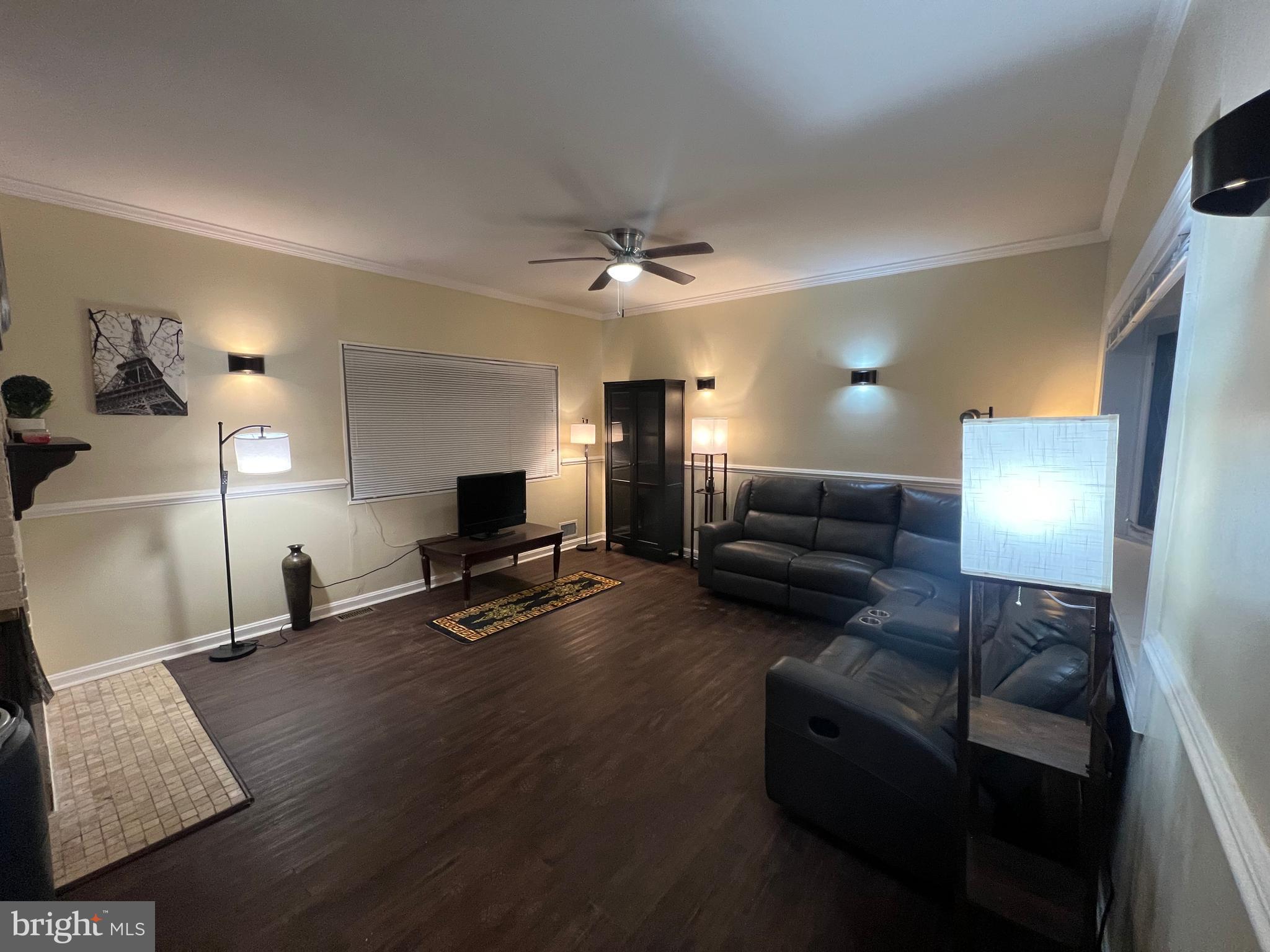 11321 College View Drive Silver Spring, MD 20902 - Photo 7 of 75 a living room with furniture and a flat screen tv