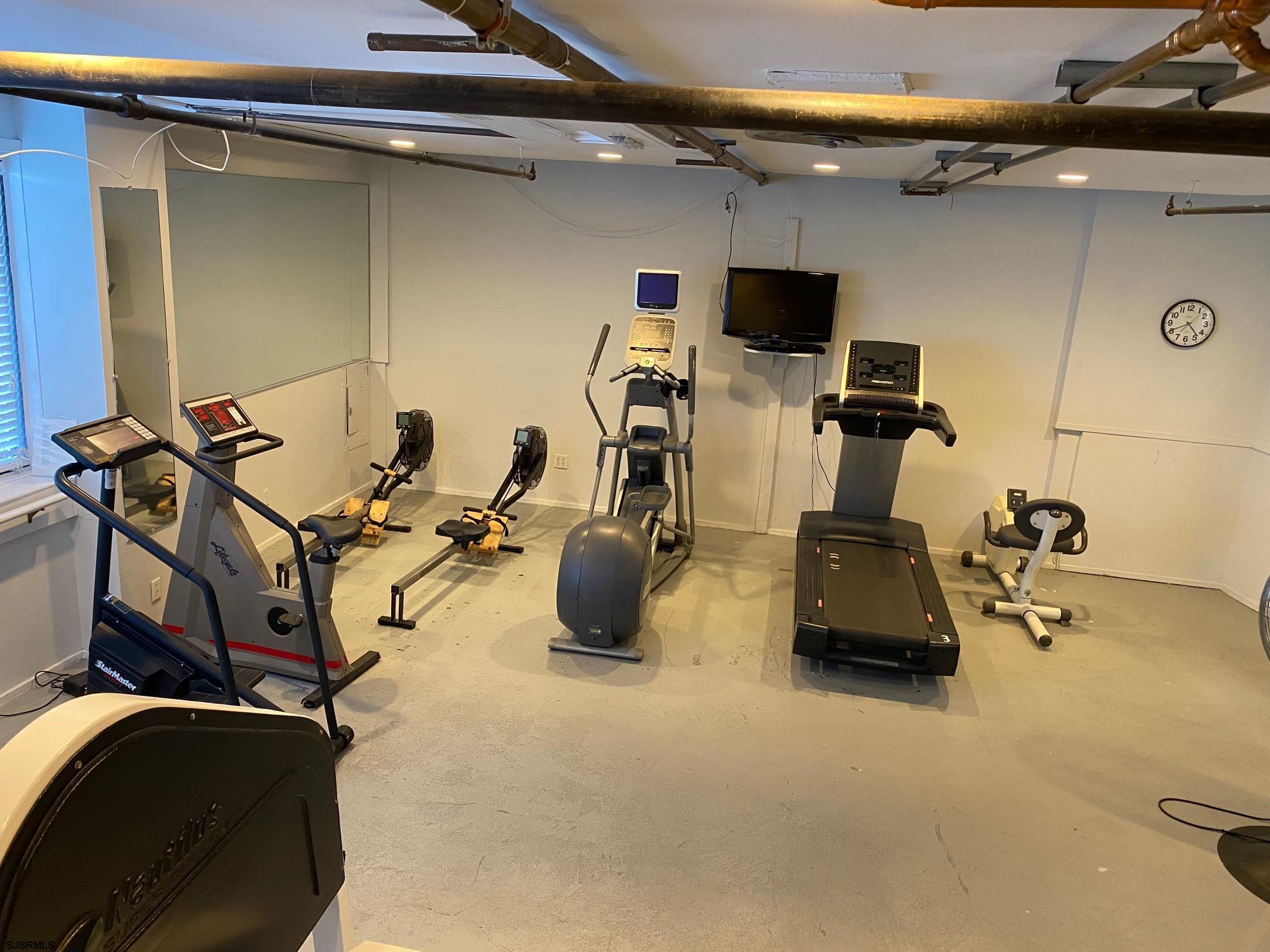 101 South Raleigh Avenue, Unit 210 Atlantic City, NJ 08401 - Photo 22 of 24 a view of a room with gym equipment