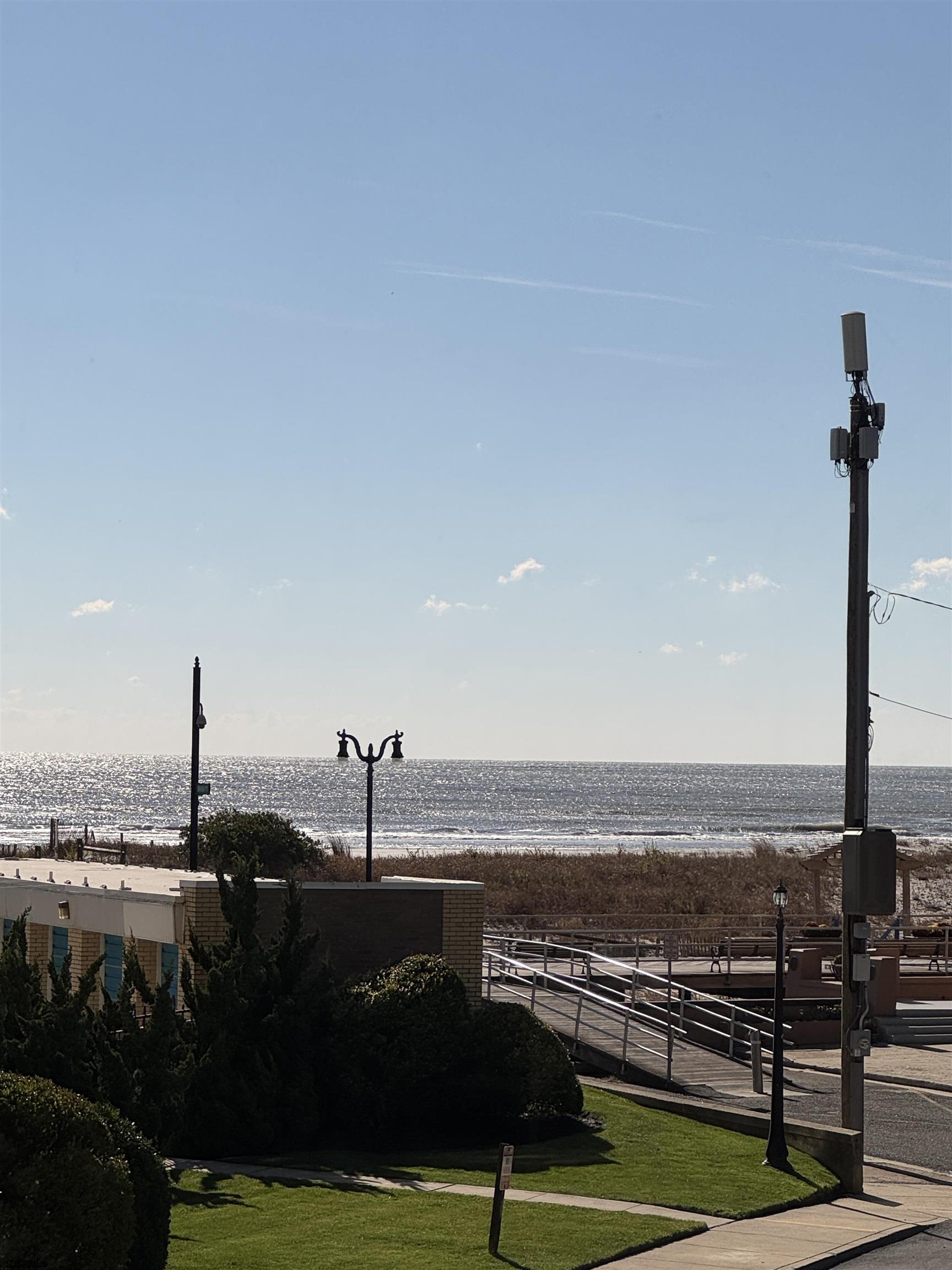 101 South Raleigh Avenue, Unit 210 Atlantic City, NJ 08401 - Photo 6 of 24 a view of a terrace with wooden floor and lake view