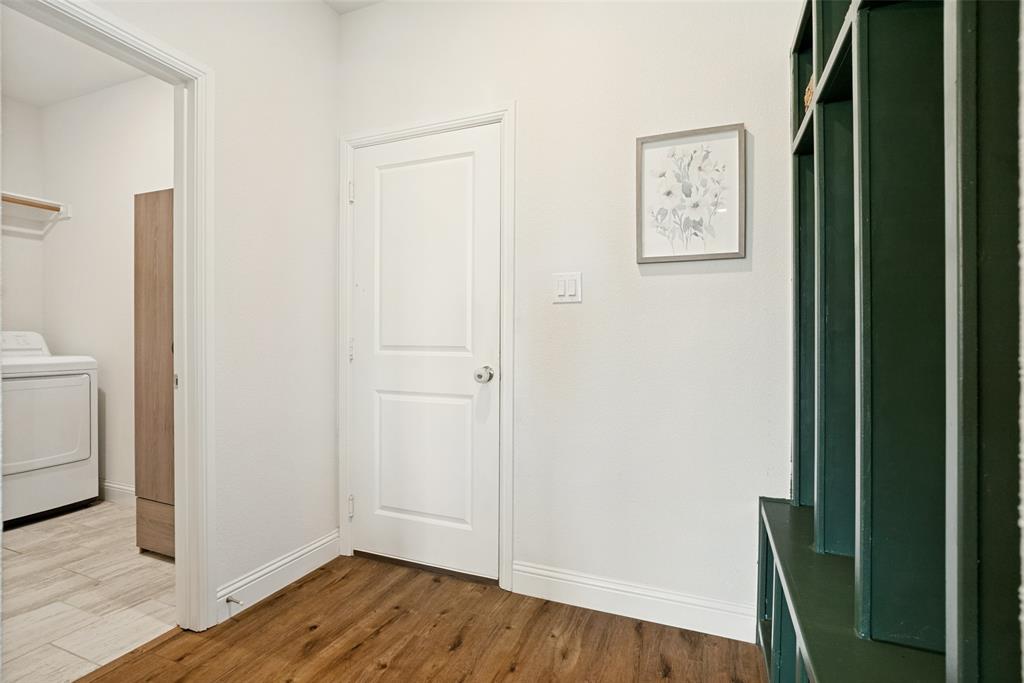 9424 Wildcat Ridge Godley, TX 76044 - Photo 12 of 25 a view of a hallway with wooden floor