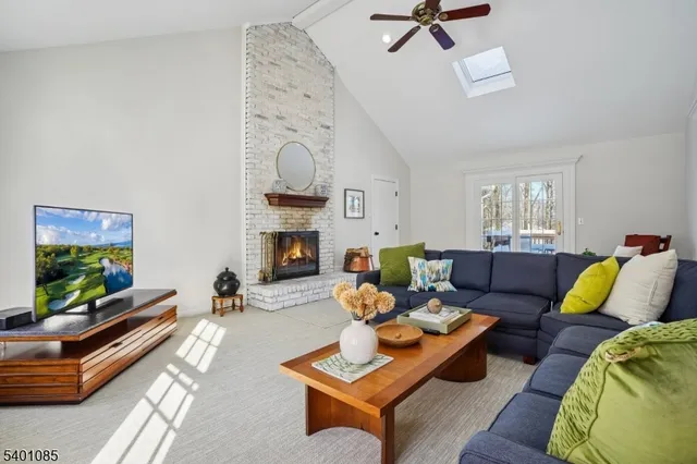 a living room with furniture and window