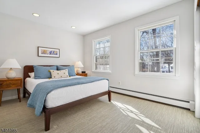 a view of a chairs and tables in the balcony