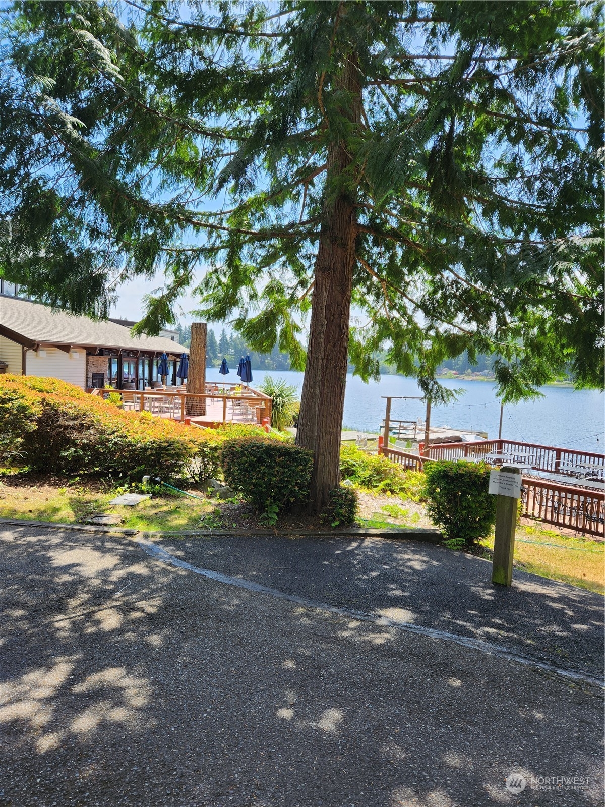 12506 Yoman Road Anderson Island, WA 98303 - Photo 8 of 11 a view of swimming pool yard and lake view