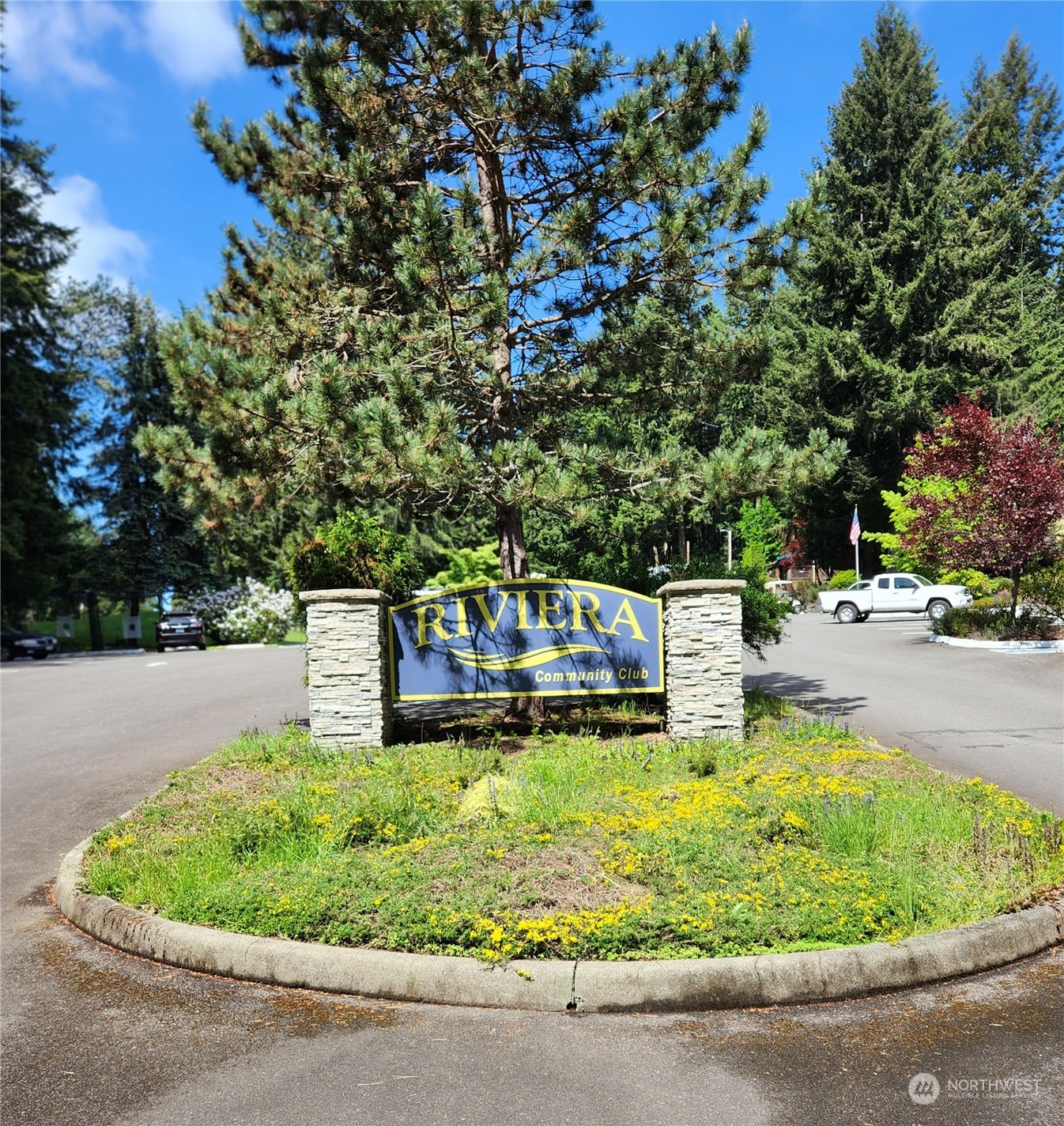 12506 Yoman Road Anderson Island, WA 98303 - Photo 9 of 11 a swimming pool with outdoor seating and yard