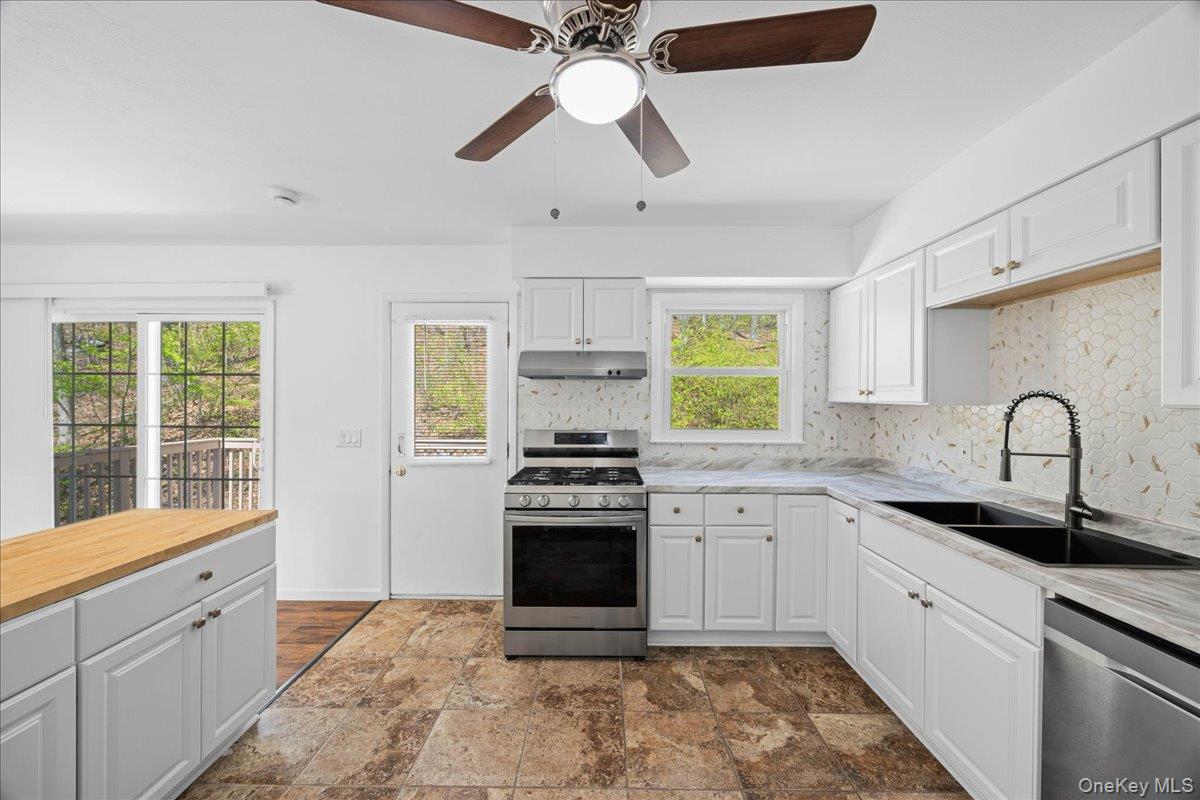 1168 Lakes Road Monroe, NY 10950 - Photo 13 of 41 Updated kitchen with stainless appliances and kitchen island.