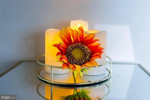 a picture of a bathroom with a sink and vanity