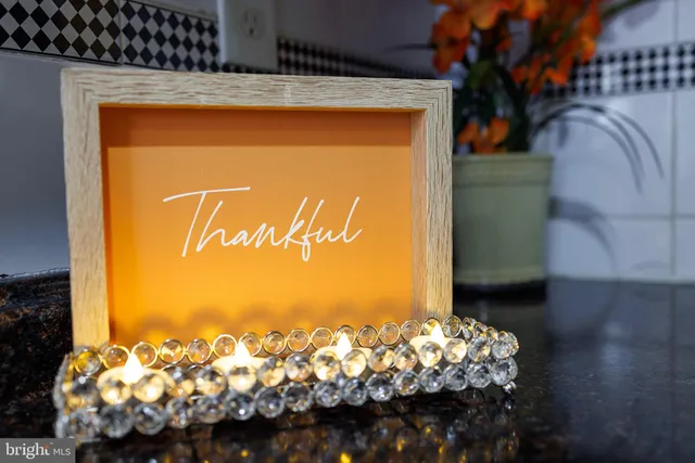 a potted plant sitting on a window sill and a window