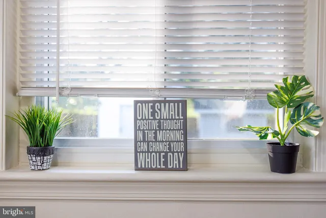 a vase of flowers sitting on a table