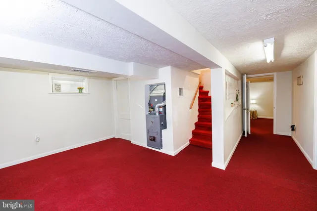 a view of a table chair in wooden floor