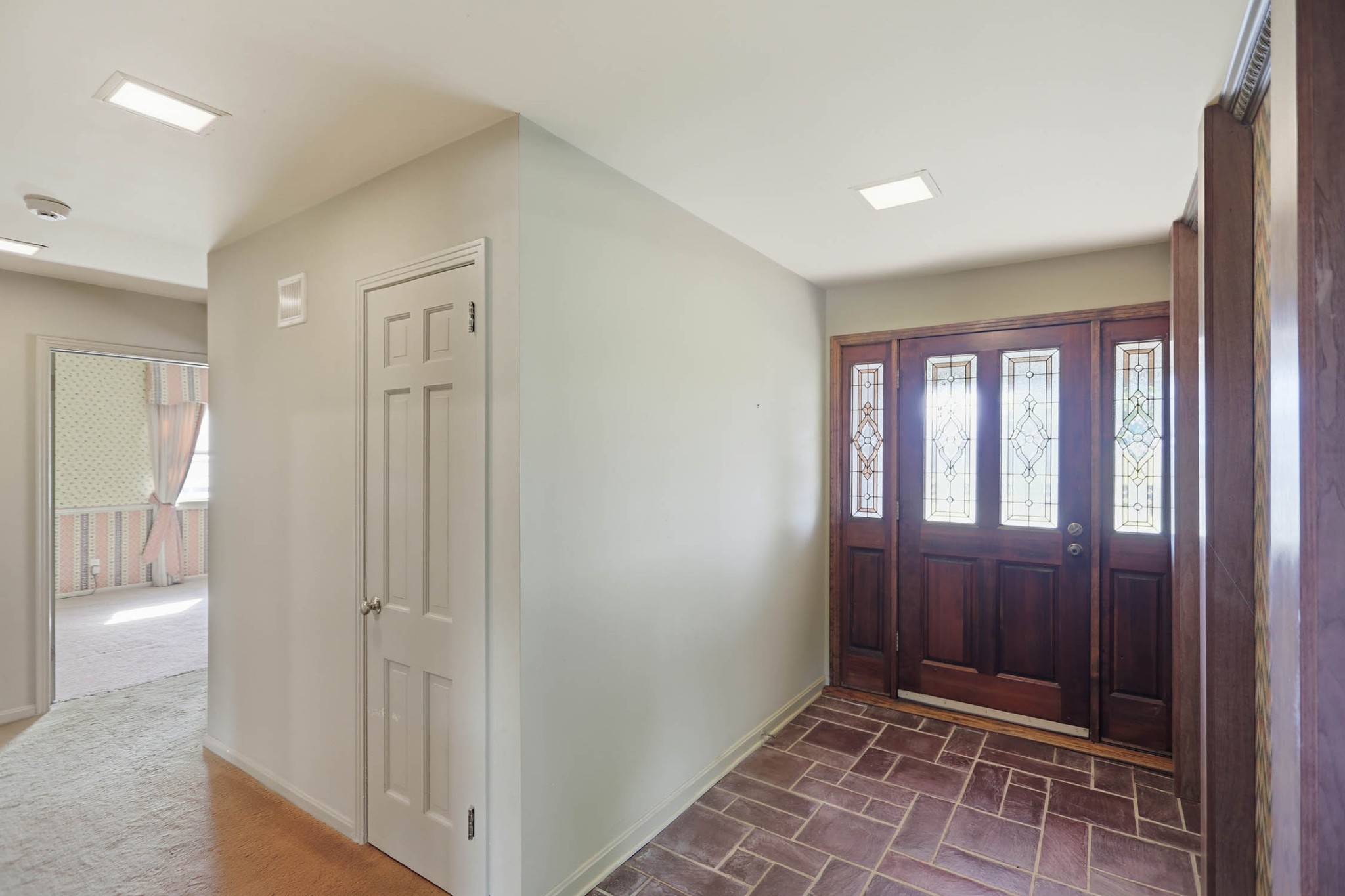 4231 Airport Road Springfield, TN 37172 - Photo 3 of 39 a view of hallway with windows and cabinet