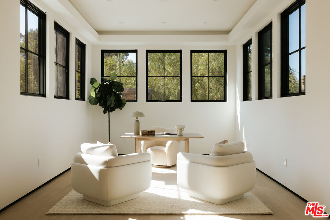 24640 Wingfield Road Hidden Hills, CA 91302 - Photo 21 of 34 a bathroom with a toilet sink and mirror