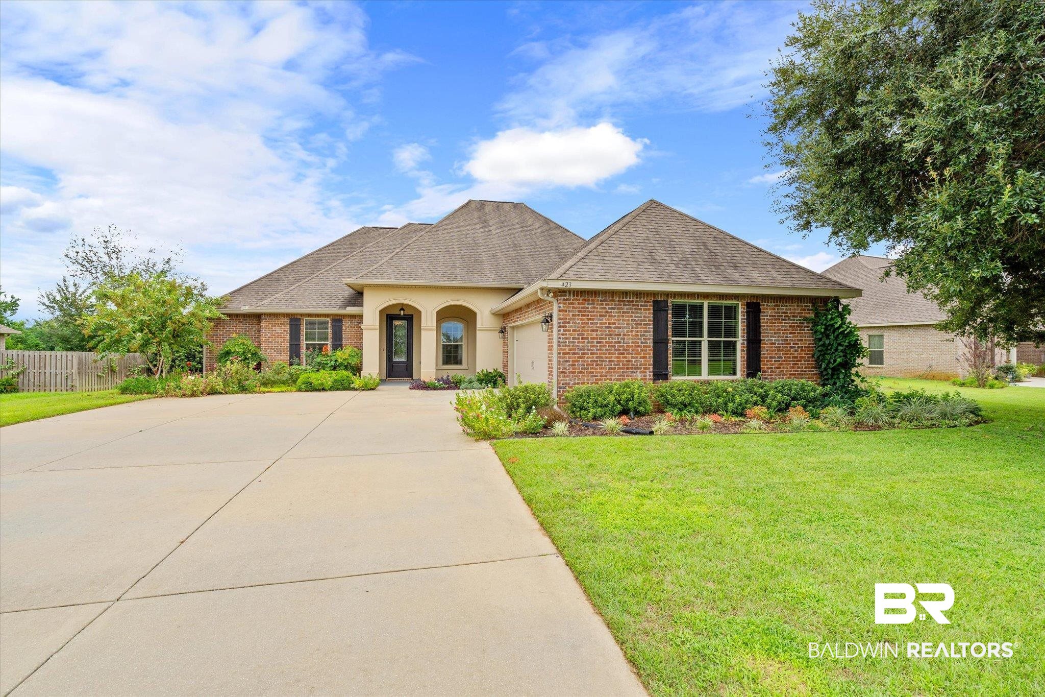 423 Breckin Drive Fairhope, AL 36532 - Photo 1 of 31 View of front of property featuring a garage and a front yard