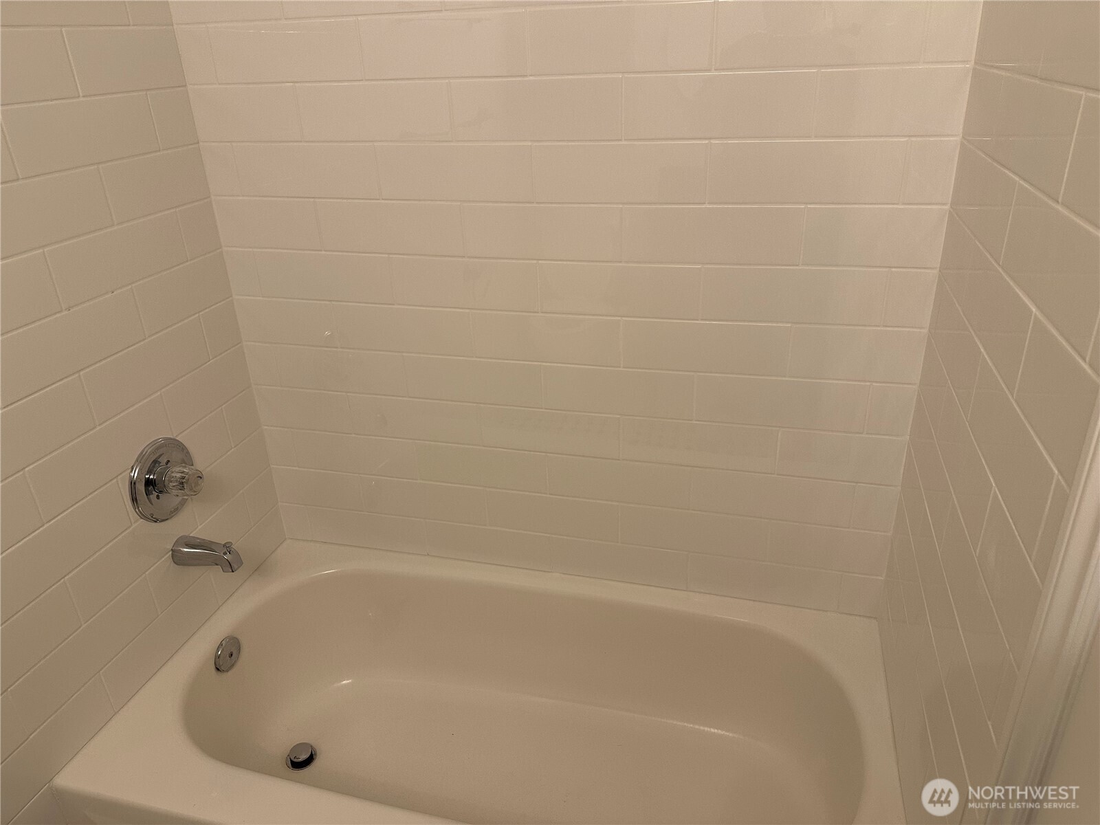 21923 3rd Place West Bothell, WA 98021 - Photo 15 of 19 a close up of a bathtub in a bathroom