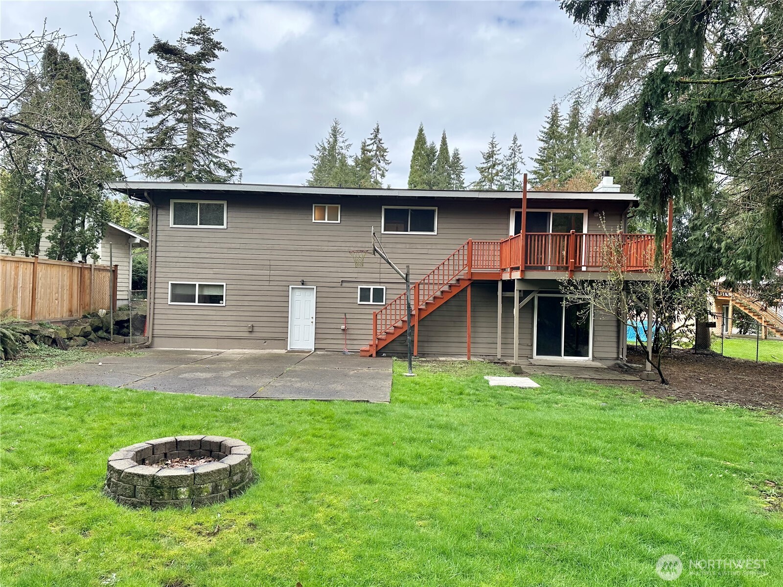 21923 3rd Place West Bothell, WA 98021 - Photo 19 of 19 a view of a yard with a house and a large tree