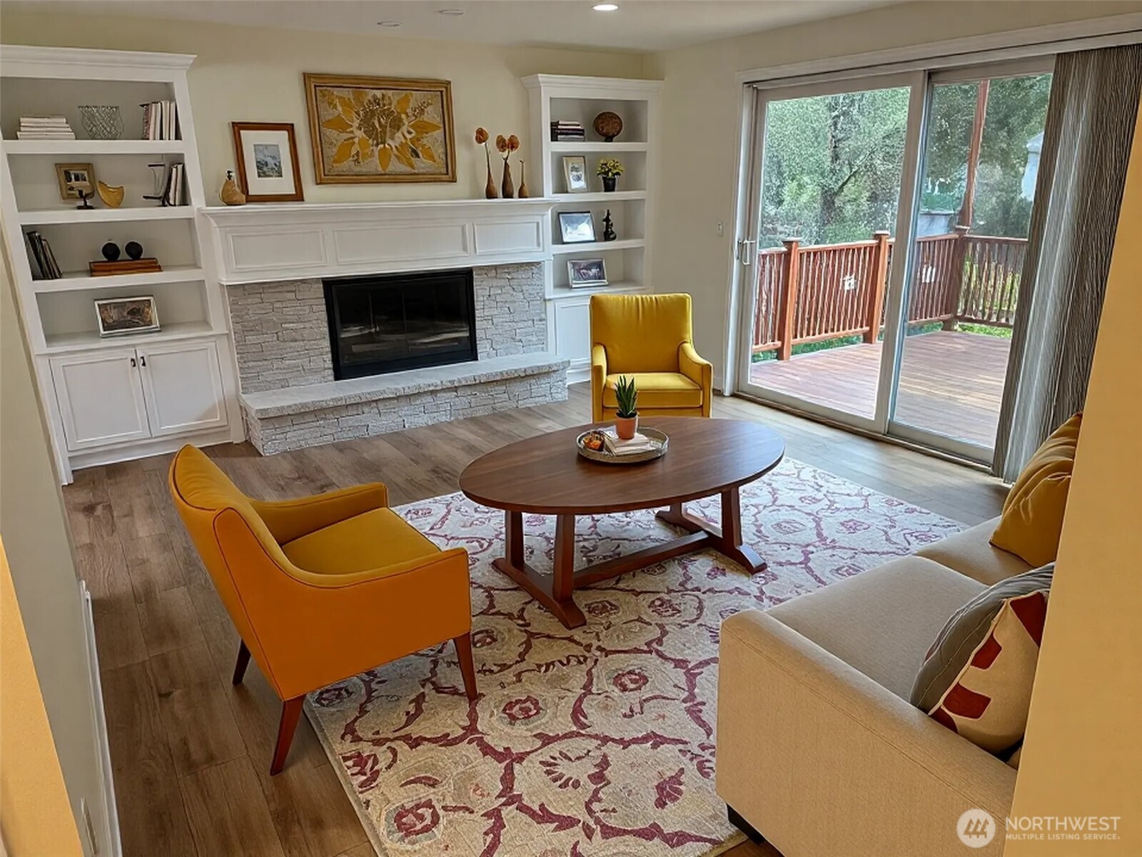 21923 3rd Place West Bothell, WA 98021 - Photo 2 of 19 a living room with furniture a flat screen tv and a fireplace