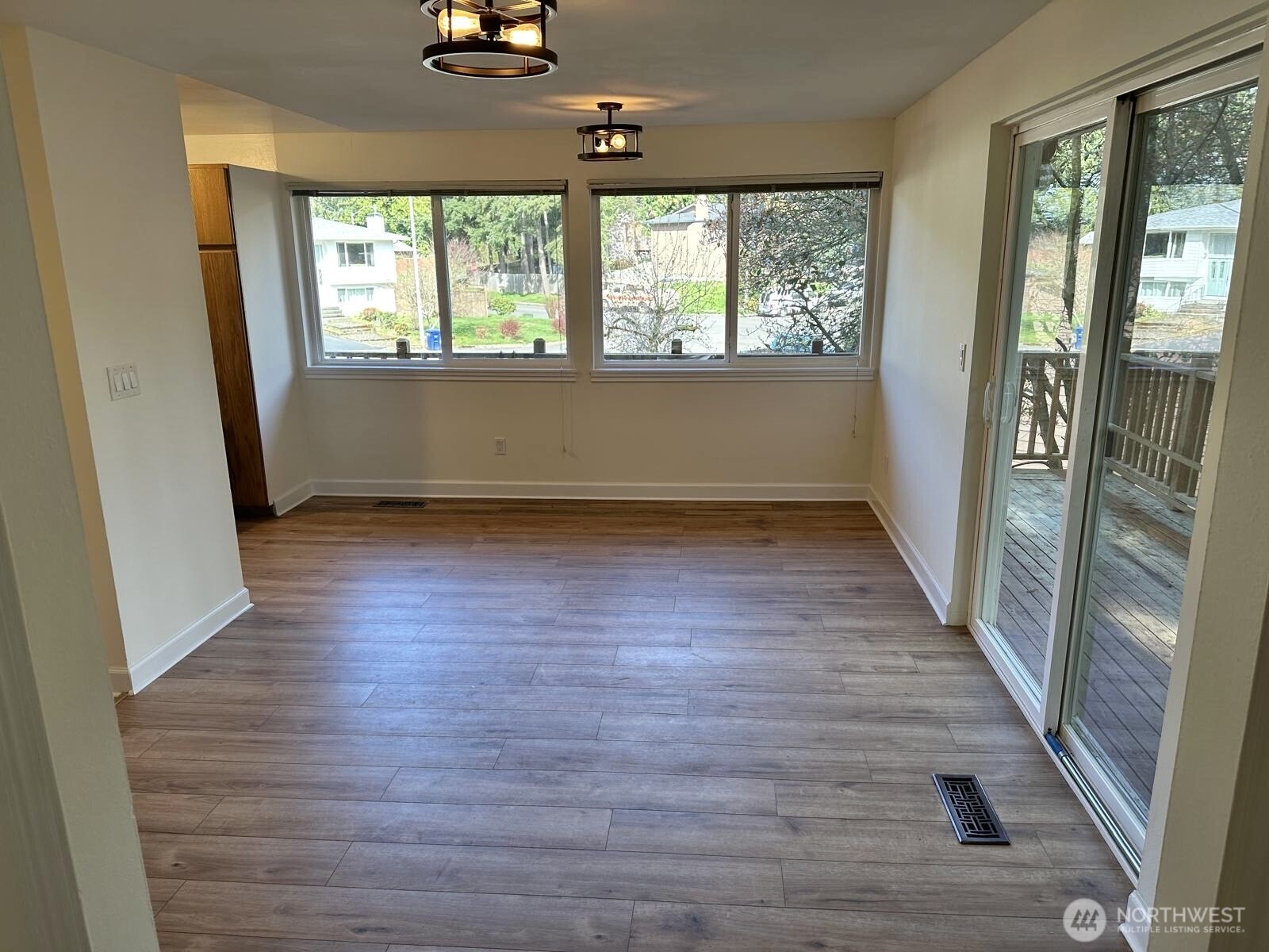 21923 3rd Place West Bothell, WA 98021 - Photo 6 of 19 an empty room with wooden floor and windows