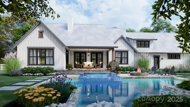 a front view of a house with garden and swimming pool