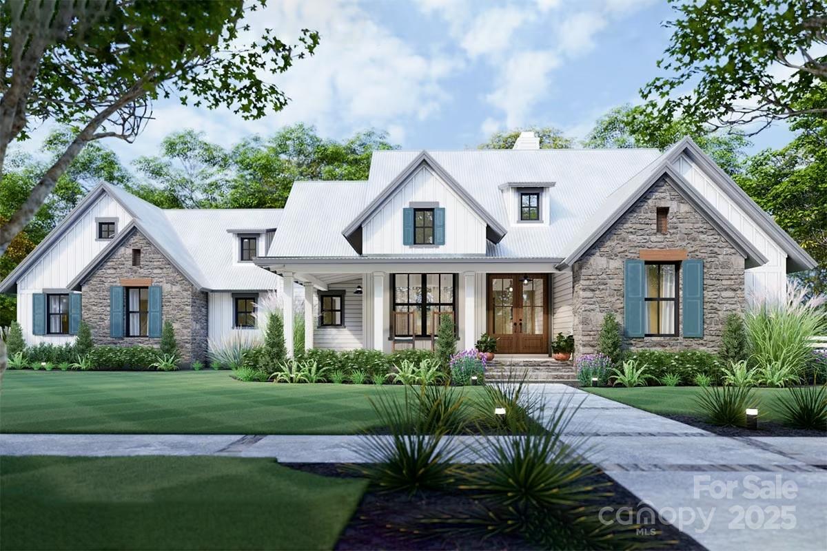 6503 Rehobeth Road, Unit 5 Waxhaw, NC 28173 - Photo 4 of 8 a front view of a house with a yard