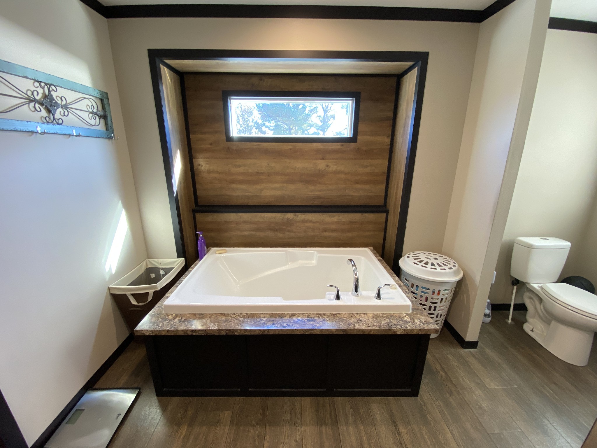 255 Rascal Town Road Loretto, TN 38469 - Photo 19 of 54 a bathroom with a sink and a bathtub
