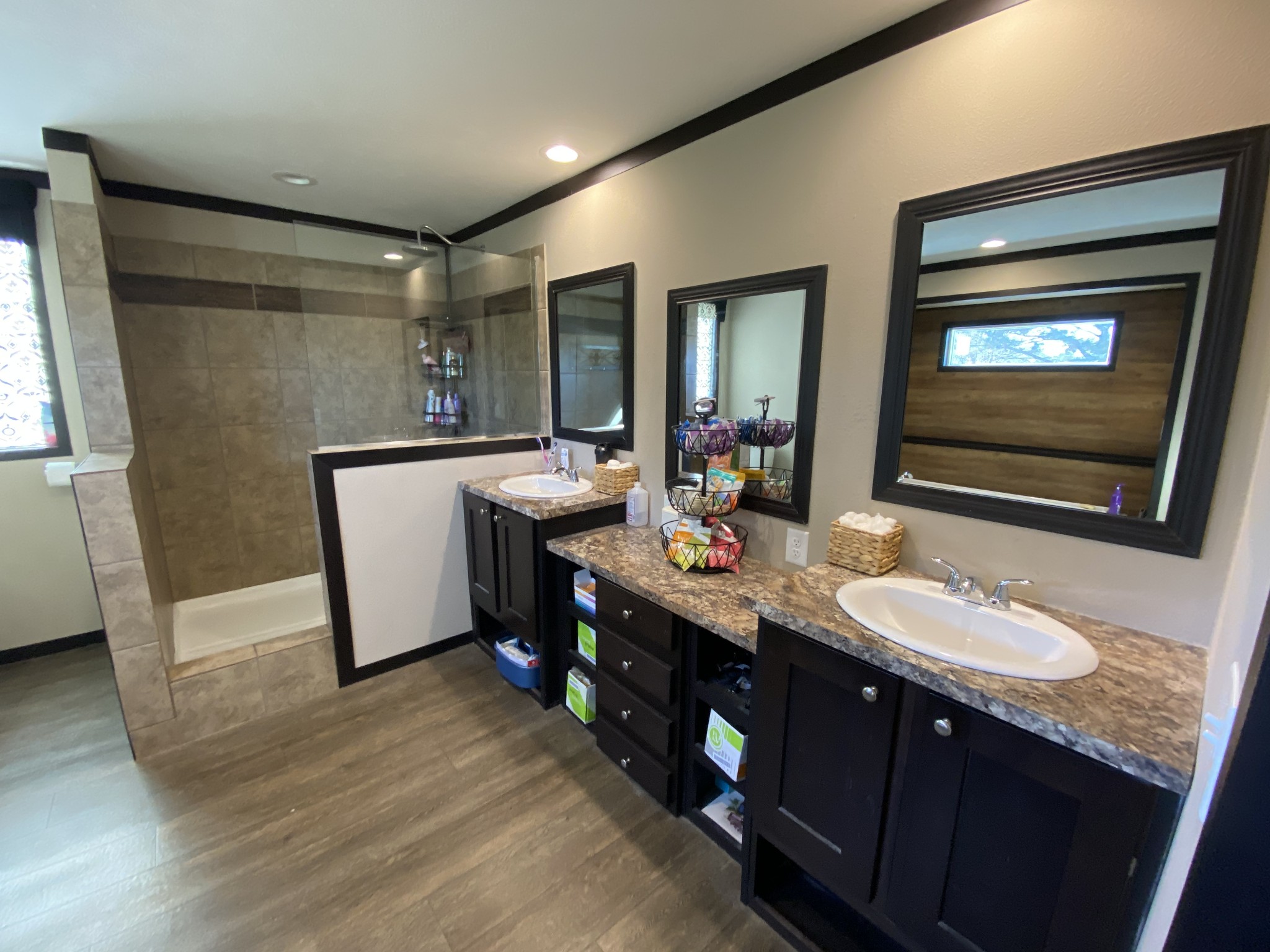 255 Rascal Town Road Loretto, TN 38469 - Photo 23 of 54 a bathroom with a sink double vanity granite and a mirror