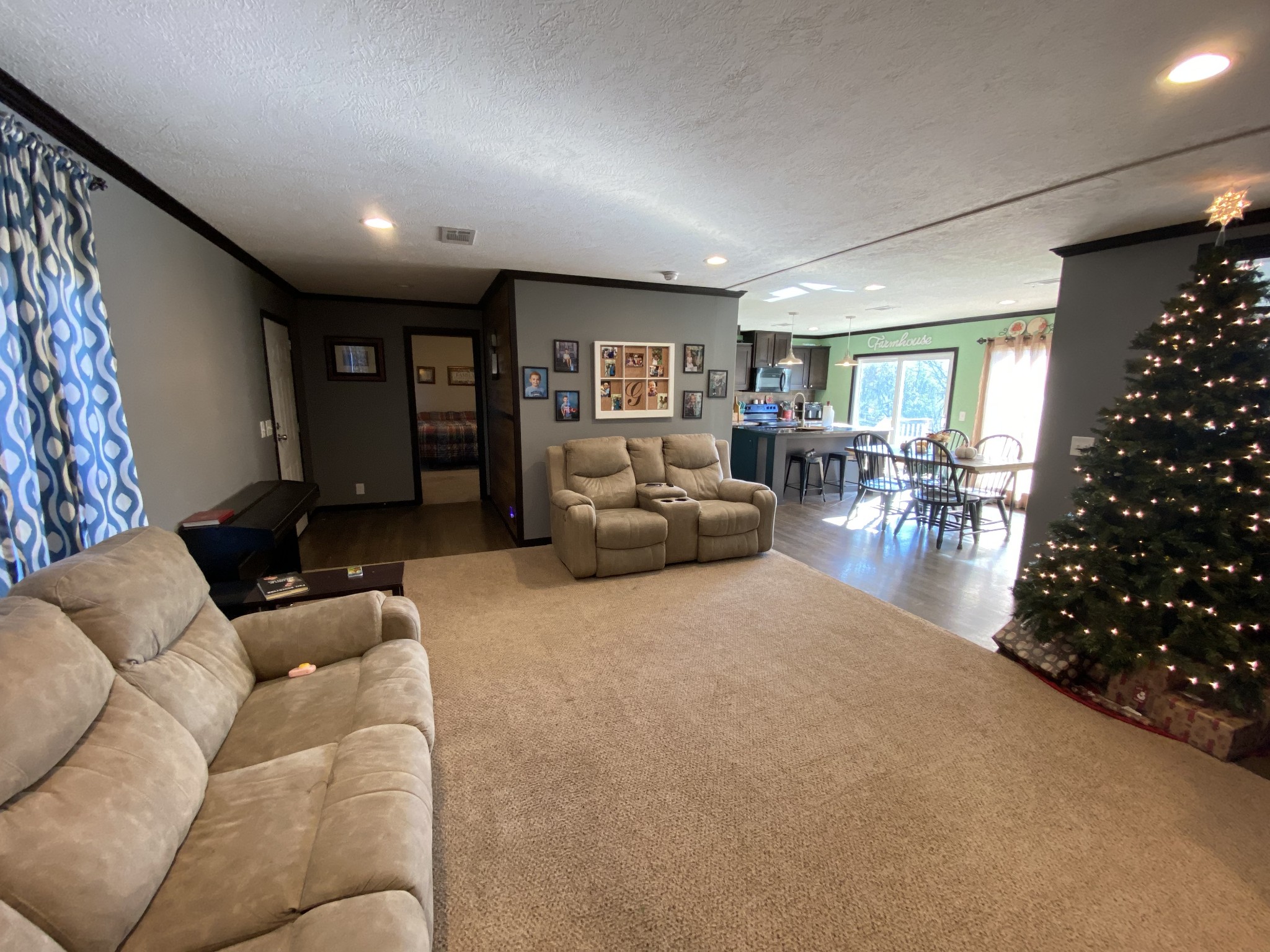 255 Rascal Town Road Loretto, TN 38469 - Photo 27 of 54 a living room with furniture and a flat screen tv