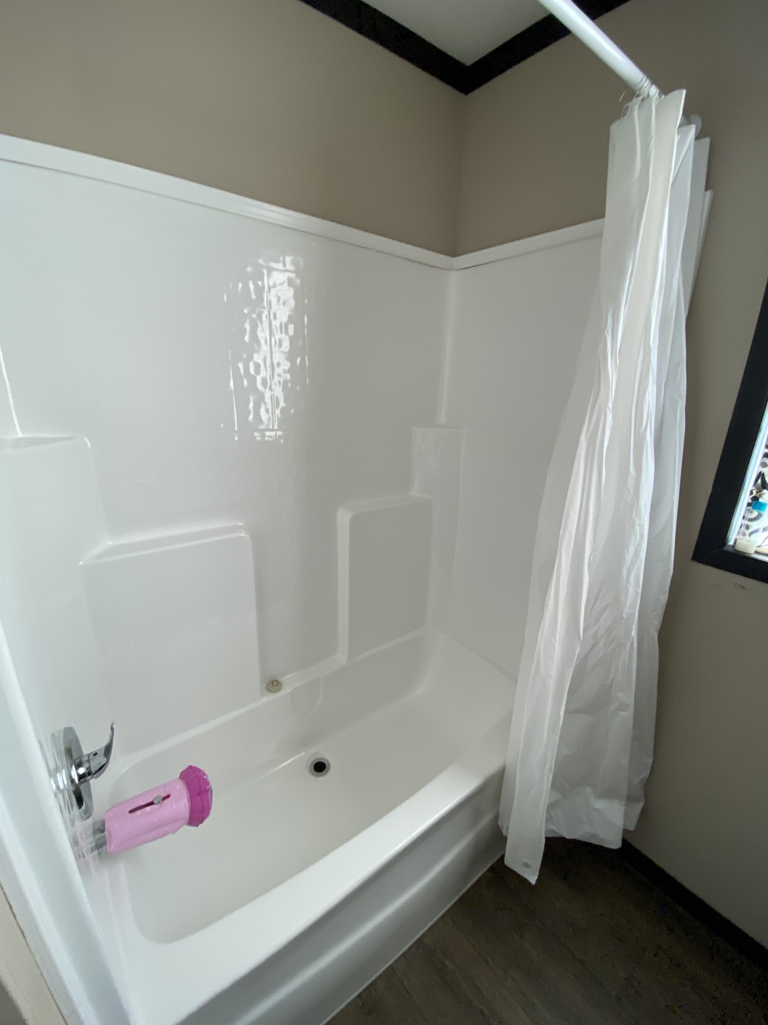 255 Rascal Town Road Loretto, TN 38469 - Photo 38 of 54 a bathroom with a bathtub and shower