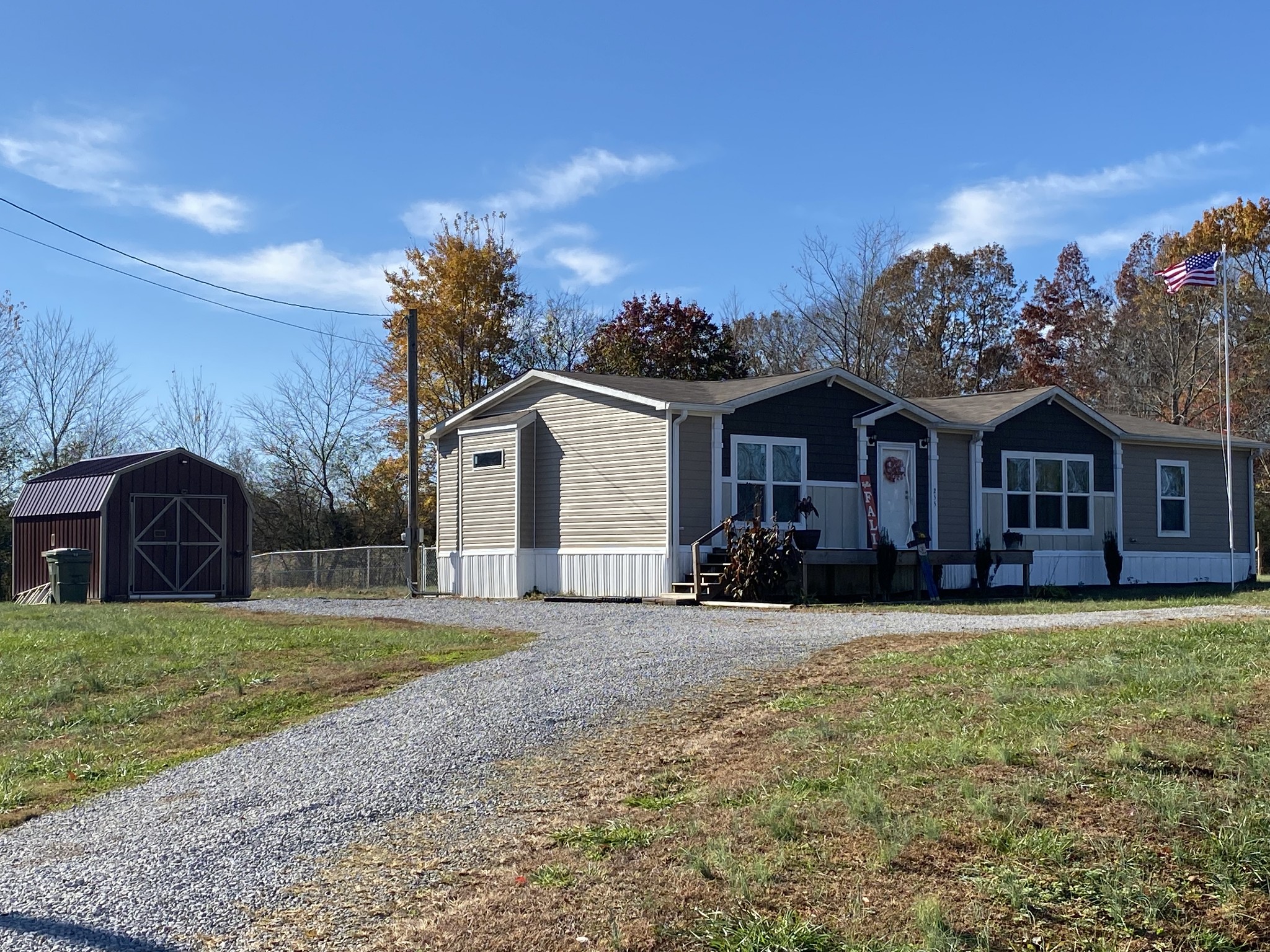 255 Rascal Town Road Loretto, TN 38469 - Photo 5 of 54 a view of a house with a yard