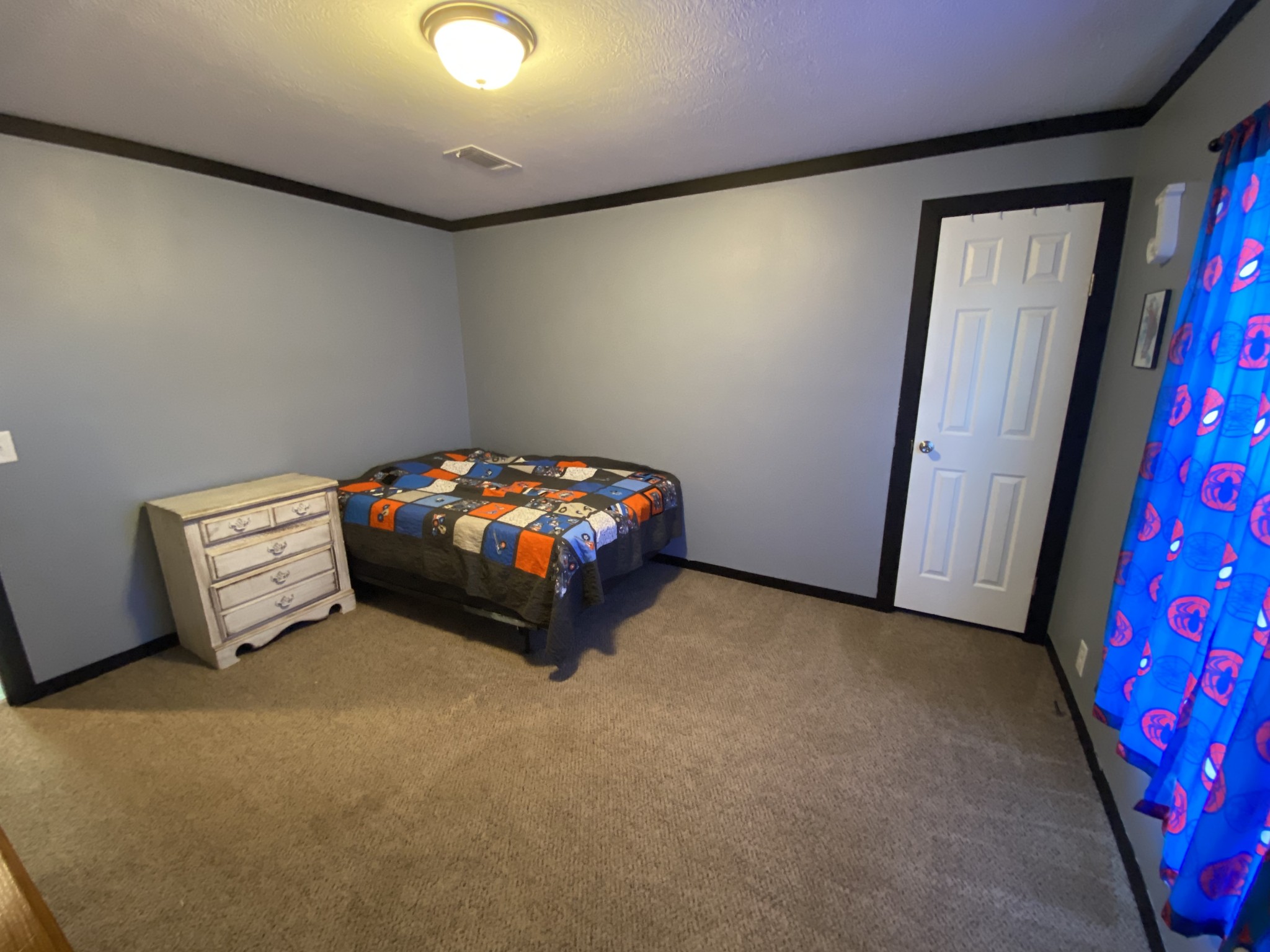 255 Rascal Town Road Loretto, TN 38469 - Photo 43 of 54 a bedroom with bed and a mirror