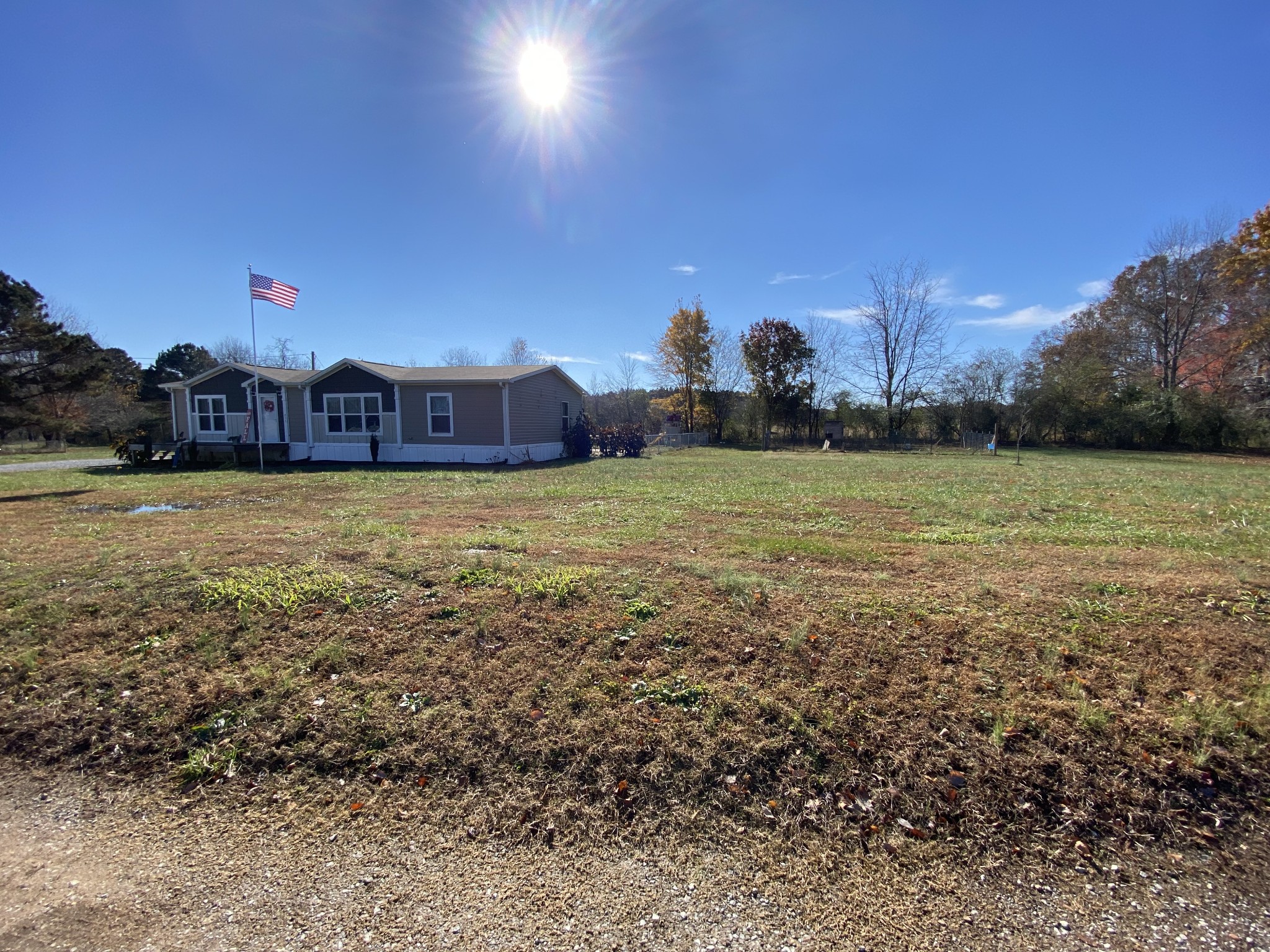 255 Rascal Town Road Loretto, TN 38469 - Photo 7 of 54 a view of a big yard with a house
