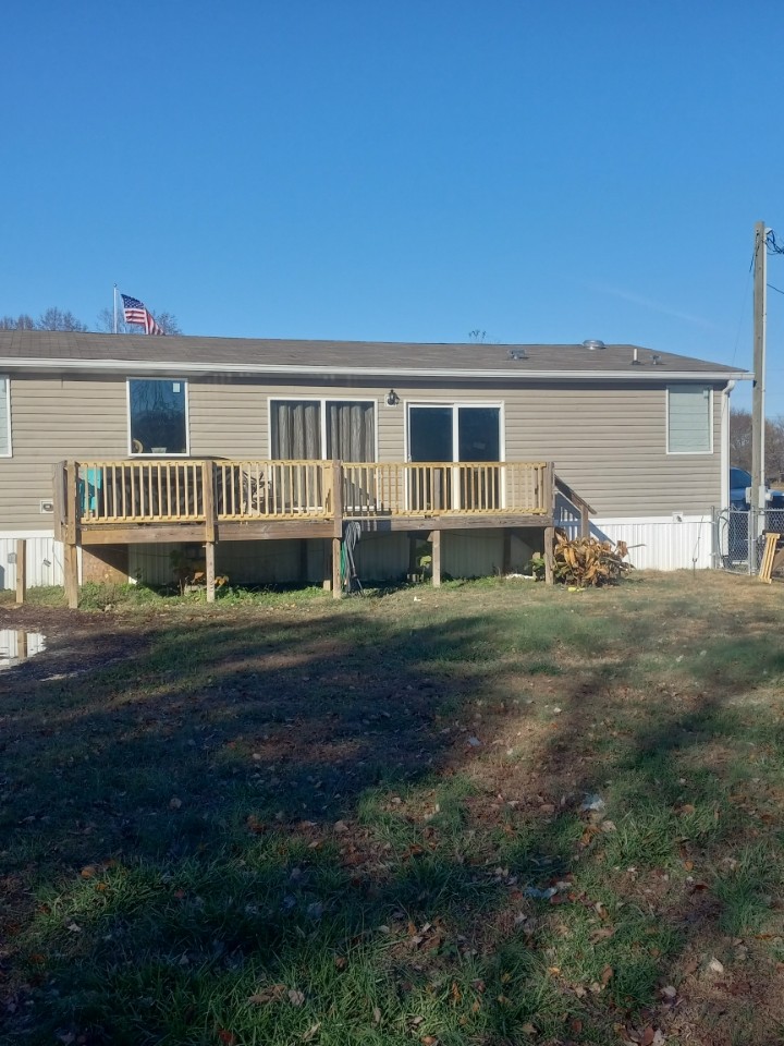 255 Rascal Town Road Loretto, TN 38469 - Photo 10 of 54 a front view of a house with a yard