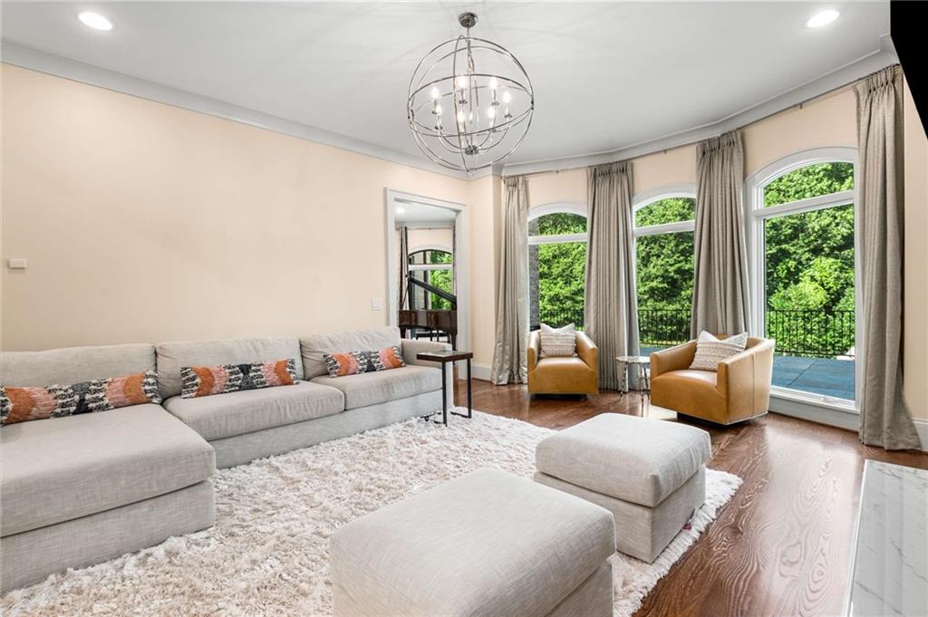 2340 Thisel Down Drive Statham, GA 30666 - Photo 14 of 105 a living room with furniture and a large window