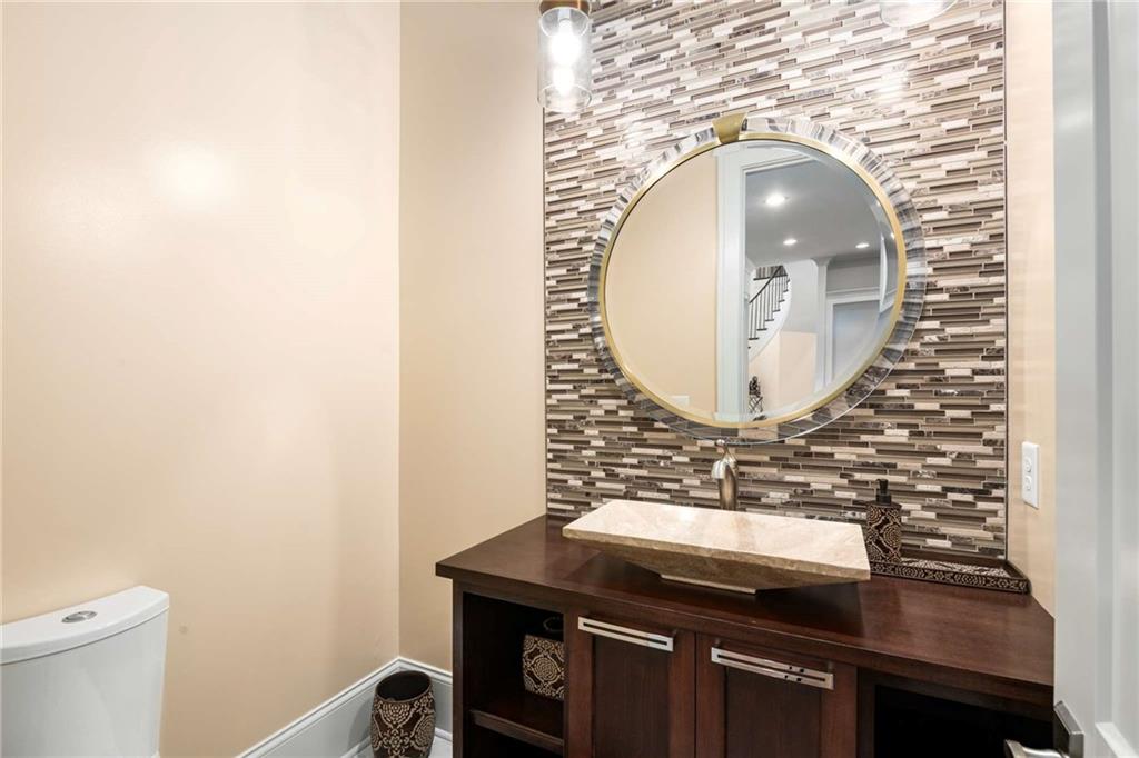 2340 Thisel Down Drive Statham, GA 30666 - Photo 28 of 105 a bathroom with a sink and a mirror