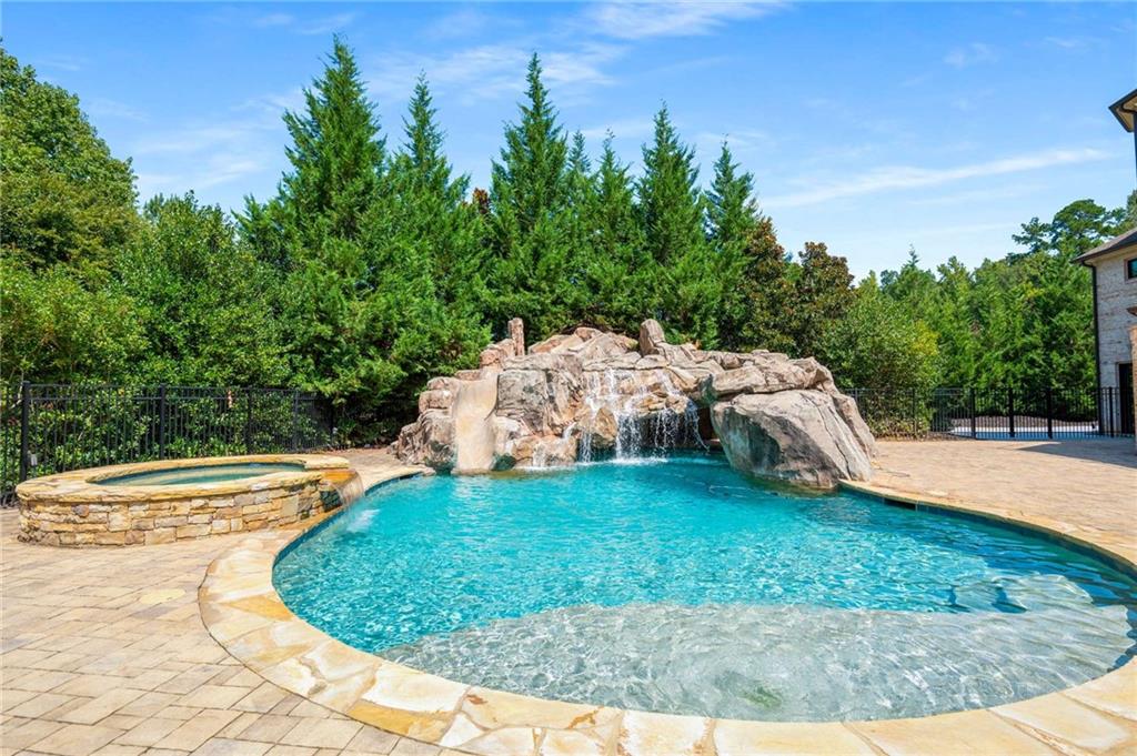 2340 Thisel Down Drive Statham, GA 30666 - Photo 46 of 105 a view of a backyard with swimming pool