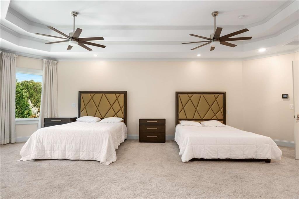 2340 Thisel Down Drive Statham, GA 30666 - Photo 57 of 105 a bedroom with two beds and painting on the wall