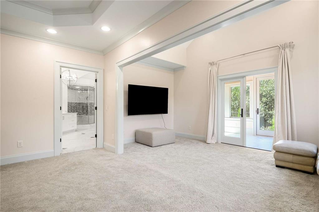 2340 Thisel Down Drive Statham, GA 30666 - Photo 61 of 105 a living room with furniture and a flat screen tv