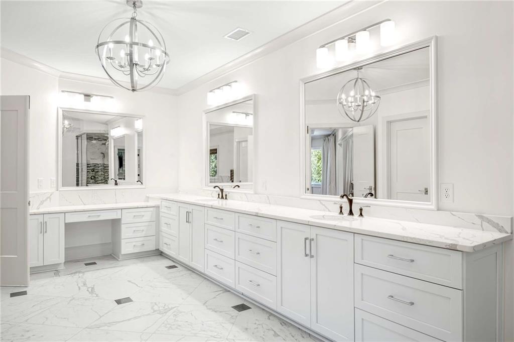 2340 Thisel Down Drive Statham, GA 30666 - Photo 64 of 105 a spacious bathroom with double sink and a mirror