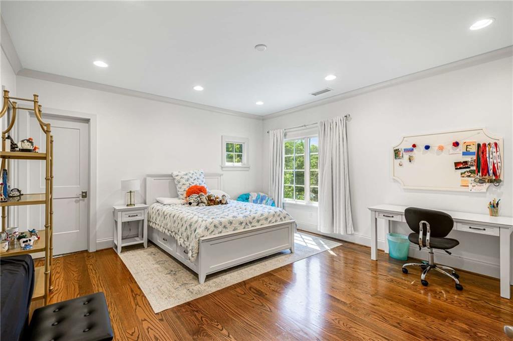 2340 Thisel Down Drive Statham, GA 30666 - Photo 71 of 105 a living room with a bed furniture and a window