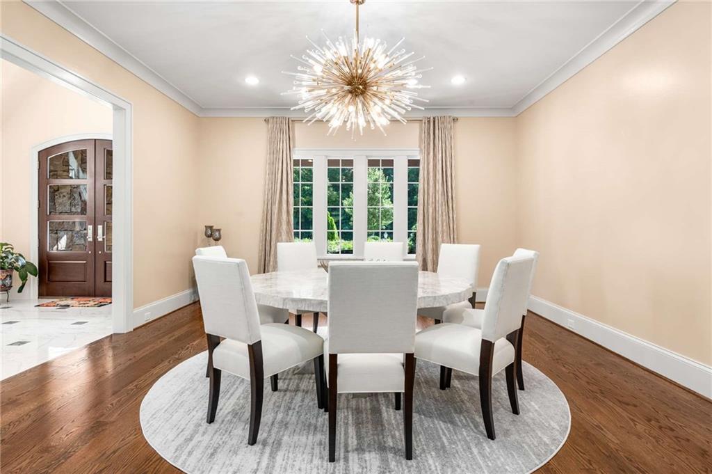 2340 Thisel Down Drive Statham, GA 30666 - Photo 8 of 105 a view of a dining room with furniture window and outside view
