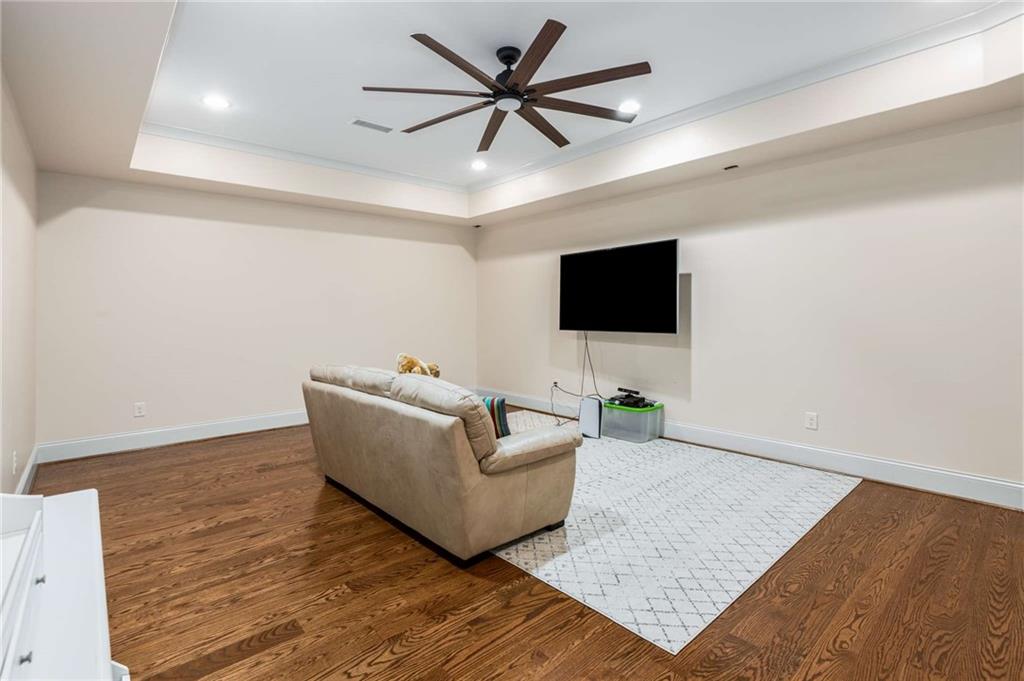 2340 Thisel Down Drive Statham, GA 30666 - Photo 85 of 105 a living room with furniture and a flat screen tv